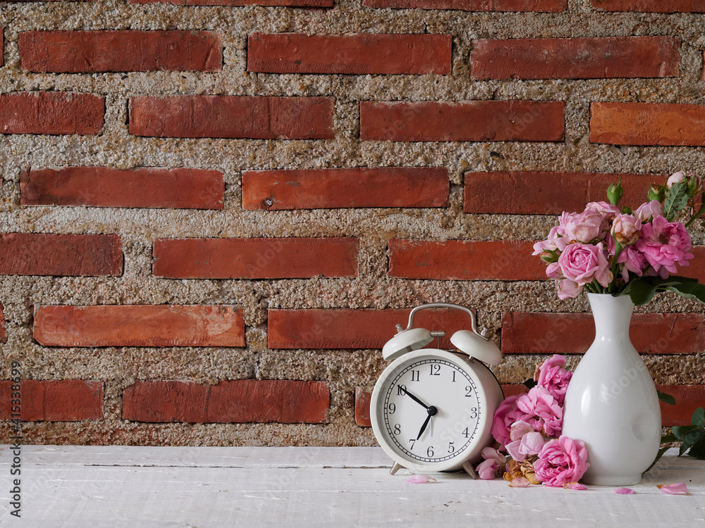 Wall mural vintage clock with pink roses