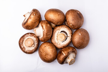 a bunch of mushrooms on a white background