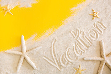 Fototapeta na wymiar Holiday word on beach sand surrounded by shells and starfish. The concept of vacation, resort and beach vacation. Yellow background with copy space for text.