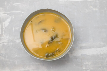 vegetable soup with spinach in the bowl