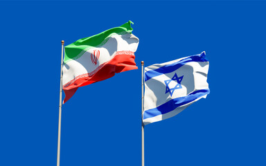 Flags of Israel and Iran.