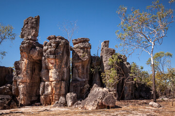 Landscape view of sandstone formations reminisicent of derelict buildings in the Lost City,...