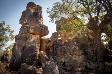Landscape view of sandstone formations reminisicent of derelict buildings in the Lost City,...