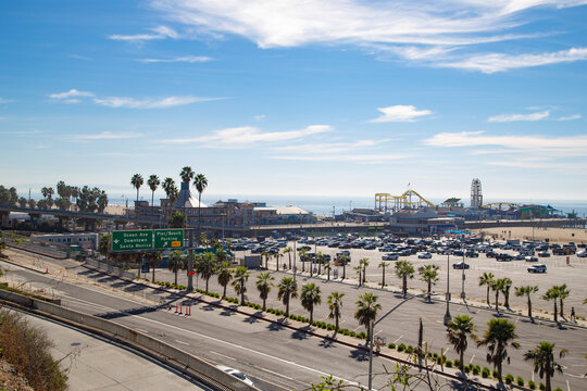 Parking zone at Santa Monica beach in los Angeles, California with pier behind