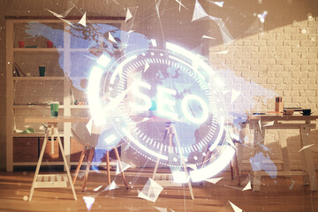 Double exposure of SEO drawing and office interior background. Concept of Search optimization engine.