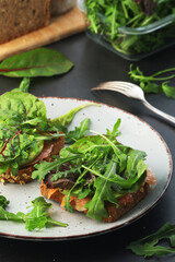 Sandwiches with salmon, avocado and salad	