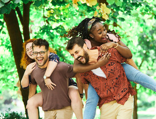 young people having fun happy group friendship student lifestyle piggyback youth teamwork together