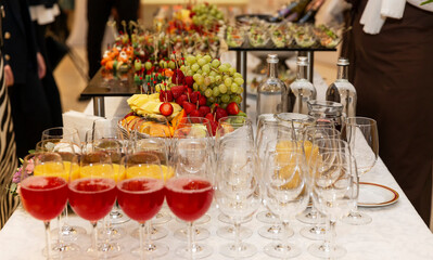 Buffet festive table with wine and snacks. Catering for business meetings, events and celebrations.