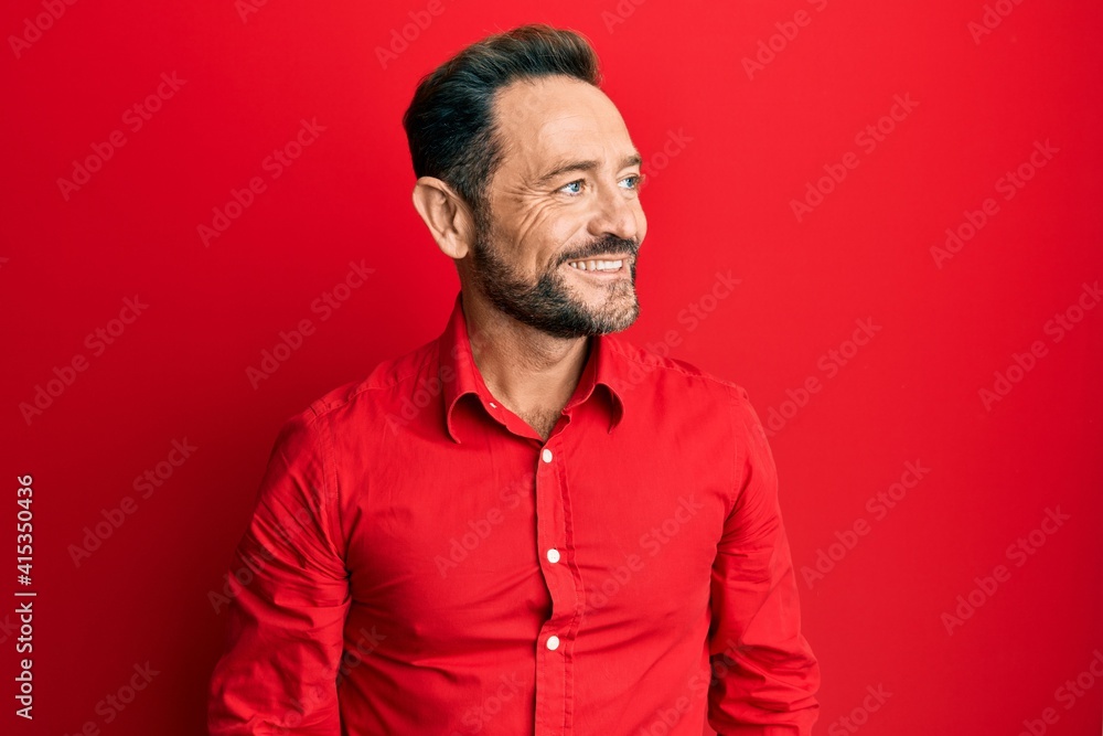 Wall mural middle age man wearing casual clothes looking to side, relax profile pose with natural face and conf