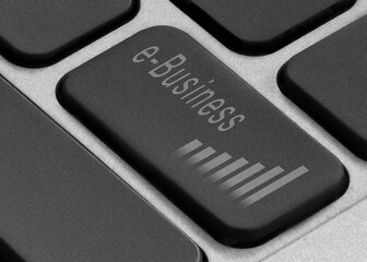 Online business concept. Laptop button with the inscription and with the image of the growth graph.