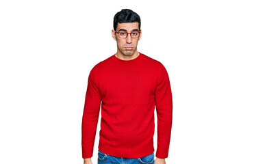 Handsome hispanic man wearing casual clothes and glasses depressed and worry for distress, crying angry and afraid. sad expression.