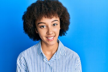 Young hispanic girl wearing casual clothes with a happy and cool smile on face. lucky person.