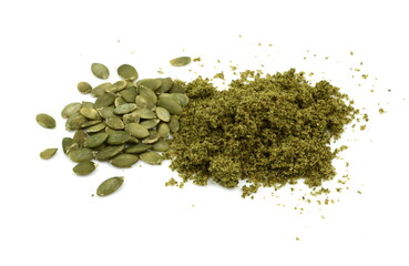 Ground pumkin seed isolated on white background. Pile of fresh pumpkin seed flour isolated. Pumpkin...