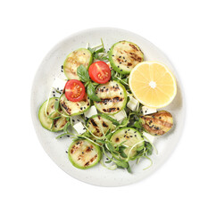 Delicious grilled zucchini slices served with feta cheese, tomatoes and lemon on white background, top view
