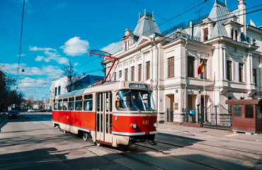 Naklejka na ściany i meble Vintage tram on the street in the historical city center. Moscow tram parade. 