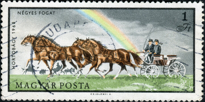 HUNGARY - CIRCA 1968: A stamp printed in Hungary shows Men and horses carriage