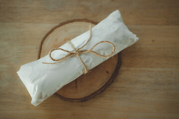 Paper packaging wrapped by rope. Concept of packaging eco friendly