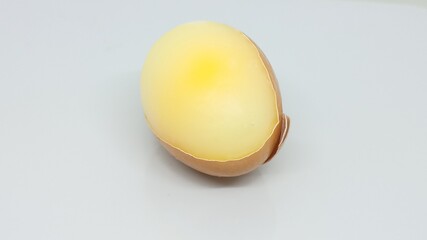 Frozen chicken egg. view after in fridge.  Unexpected Beauty A Glimmering Frozen Egg.