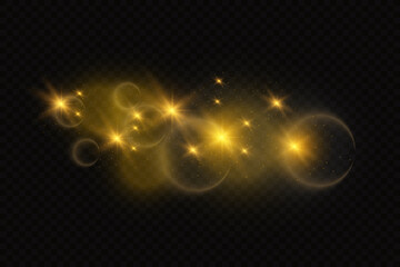 The dust sparks and golden stars shine with special light. Vector sparkles on a transparent background. Christmas light effect. Sparkling magical dust particles. 