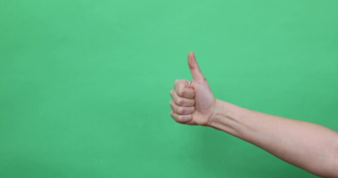 hands doing some symbol figures on green chroma key