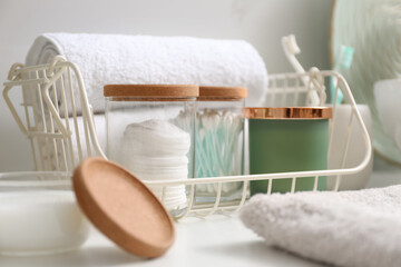 Fototapeta na wymiar Personal hygiene products and toiletries on table in bathroom