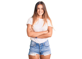 Beautiful caucasian woman wearing casual white tshirt happy face smiling with crossed arms looking at the camera. positive person.