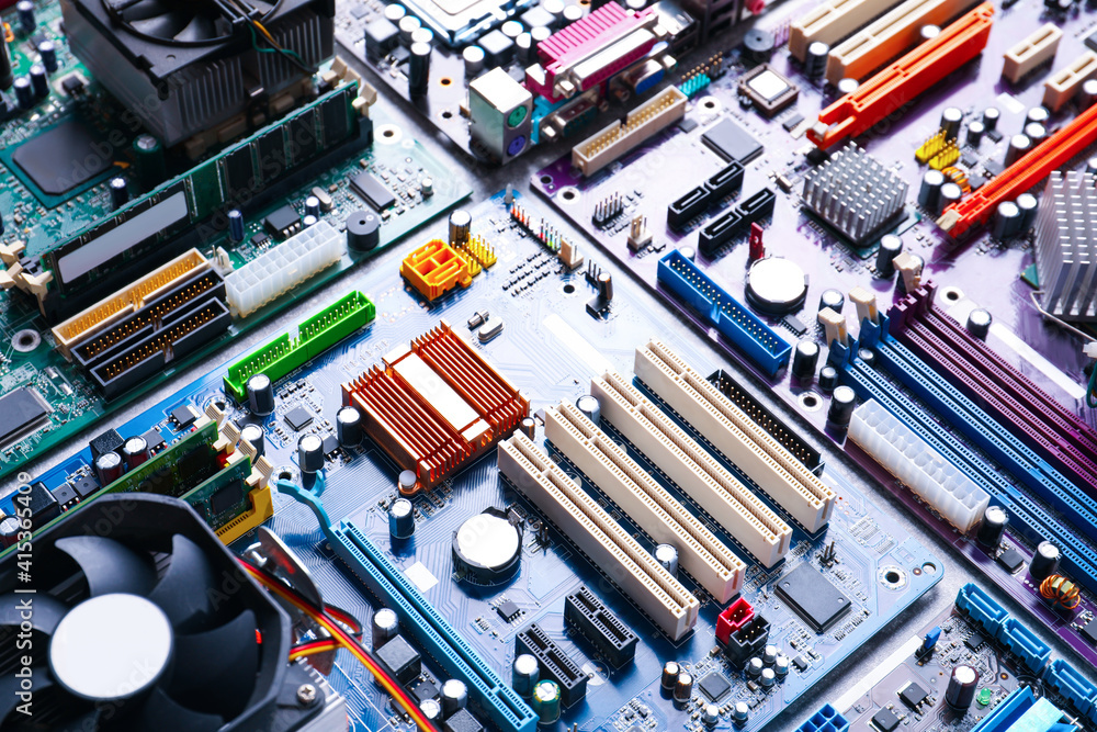 Poster many computer motherboards on table. electronic device