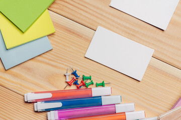 Obraz premium business cards colorful pencils work desk stationery top view