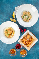 Dumplings, shrimps, hummus, menu to choose from