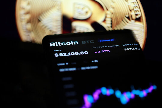 Bitcoin soars over $50,000 for the first time with its roughly 58% surge this month prompting some analysts to warn that the rally might be unsustainable. PENANG, MALAYSIA - 18 FEB 2021.