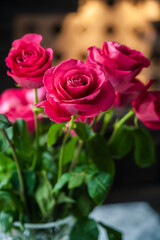 Beautiful flower bouquet of pink rose. Big bouquet of roses in vase on table.