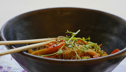 vegetables in teriyaki sauce, macro fragment in plate, side top view
