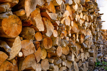 Logs for the fire. Chopped and stacked firewood. pile of firewood