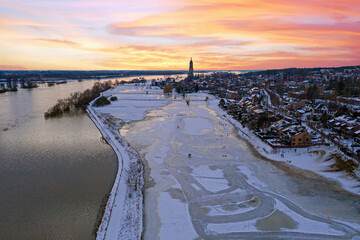 Aerial from the snowy city Rhenen in the Netherlands in winter