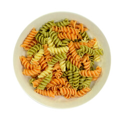 Multicolored pasta. Pasta dish isolated on white background.