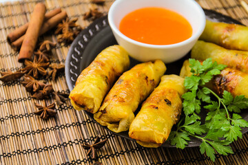 Spring rolls with sweet sauce, top view