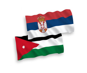 National vector fabric wave flags of Hashemite Kingdom of Jordan and Serbia isolated on white background. 1 to 2 proportion.
