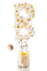 various pills fly out of a glass jar in the form of letter b, isolated on white background