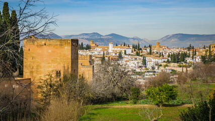 Fototapeta na wymiar View on the Alhambra fortifications and the city of Granada from the Generalife gardens in Andalusia (Spain)