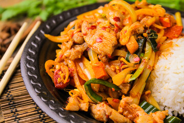 Spicy chicken with vegetables and rice