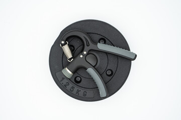 Concept image for healthy home training with grip and dumbbells
