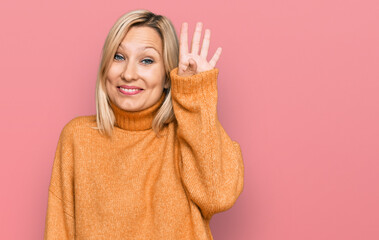 Middle age caucasian woman wearing casual winter sweater waiving saying hello happy and smiling, friendly welcome gesture