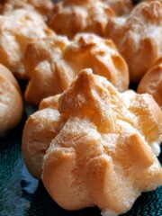 Puffs on the dark green plate