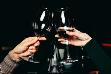 two wineglass of vine on a party
