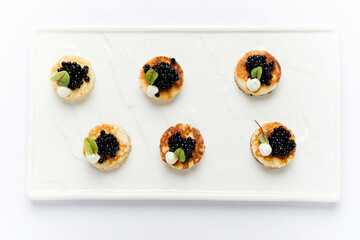 canape with caviar and cream cheese