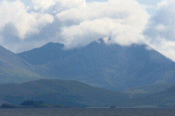 Cloud topped scottish mountain on the isle of skye. Remote wilderness