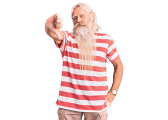 Old senior man with grey hair and long beard wearing striped tshirt looking unhappy and angry showing rejection and negative with thumbs down gesture. bad expression.