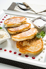 fresh pancakes with sour cream and jam