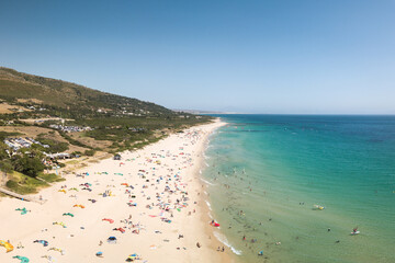 Drone perspective of wild beach situated in Tarifa , South of Spain.  Kitesurfing and wind surfing...