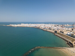 Fototapeta premium Drone panoramic view of Cadiz City. View of the south part of the city. In background the commercial harbour. Costa de Luz - Spain